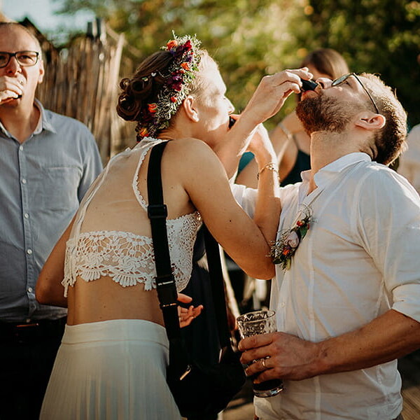 Wedding_photographer_reception_party_married_couple_guests_drinking_shots